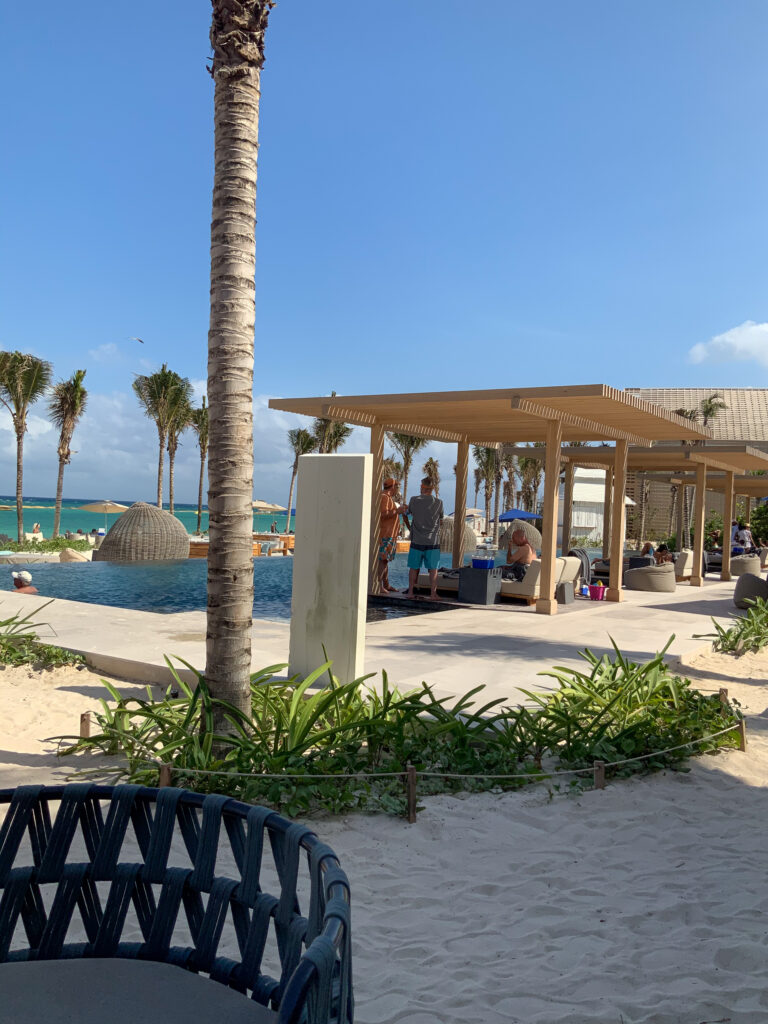 Cabanas around the beachfront pool