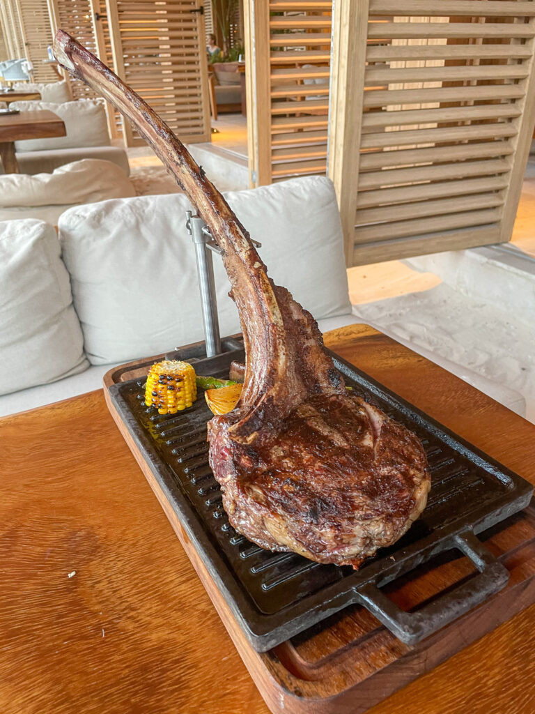 A tomahawk steak from the open-fire grill