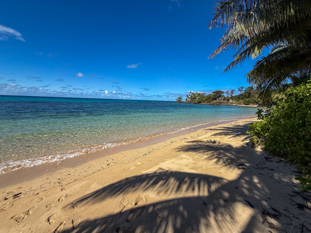 Empty white-sand beach on Kokomo