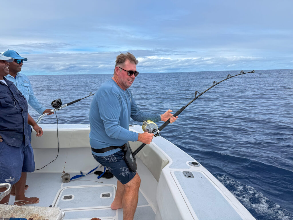 Two anglers hooked up in open water