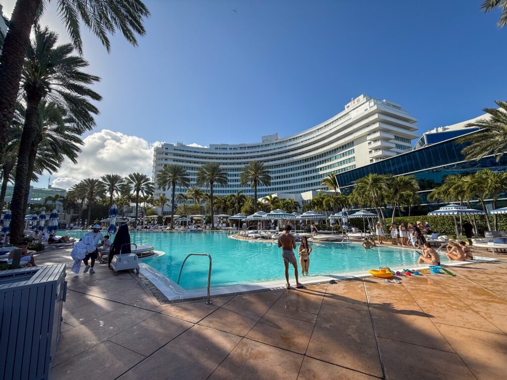 The main pool and curved Chateau tower on a clear morning