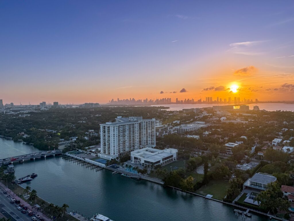 Aerial sunset over Indian Creek and the downtown Miami skyline