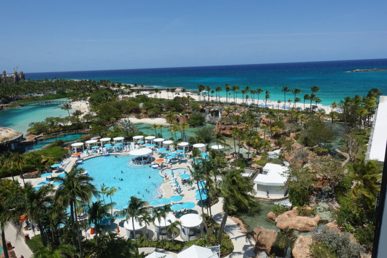 The waterpark pools from above, the ocean flat behind them