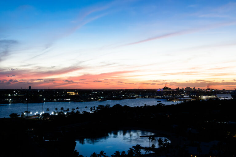 The lagoon holding the last light, purple to blue