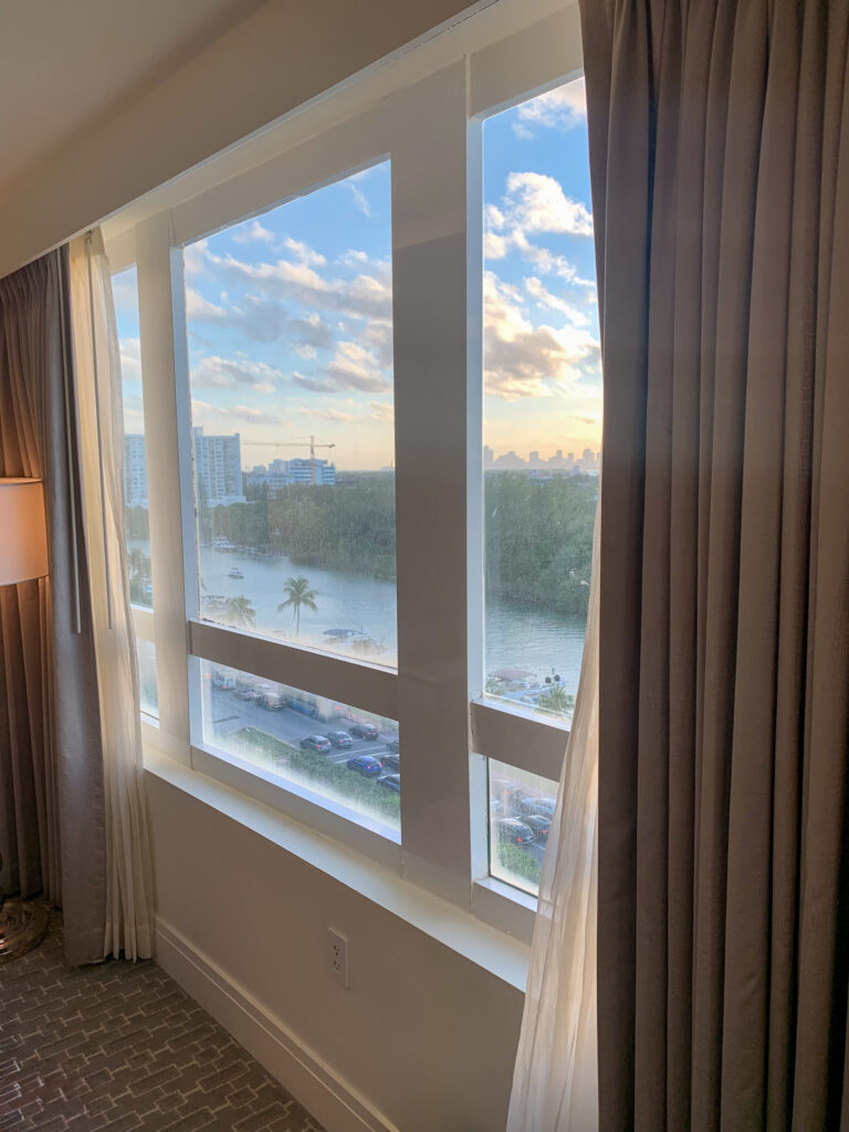 Late afternoon light through a guest room window looking west over Indian Creek