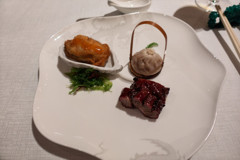 A golden puff and a steamed dumpling to open the meal