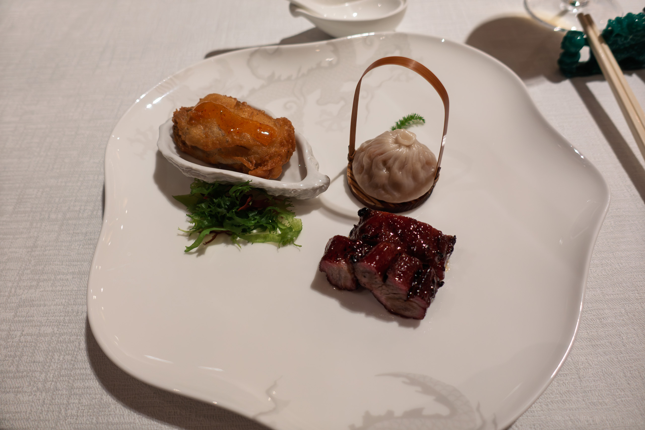 A golden puff and a steamed dumpling to open the meal