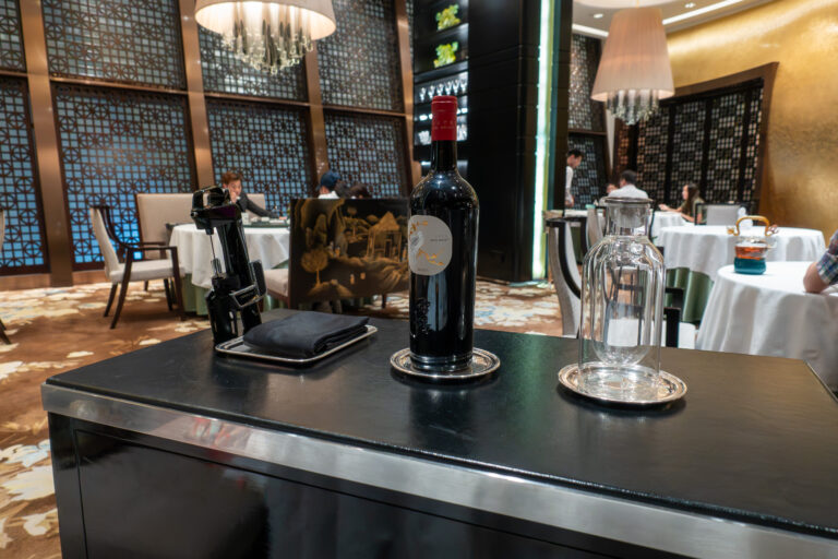 Bottles and a decanter waiting at the side station