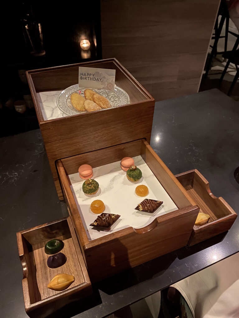 The box of petits fours at the end