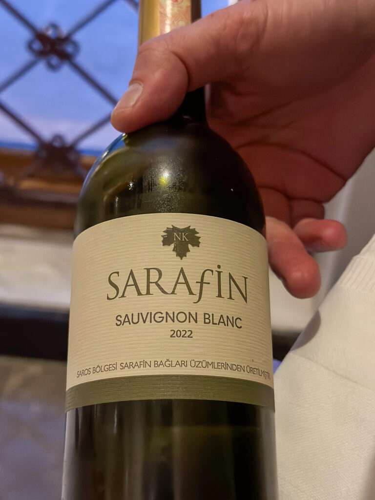 A Sarafin Sauvignon Blanc presented at the table