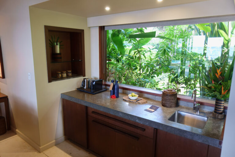 The bathroom vanity with the garden behind