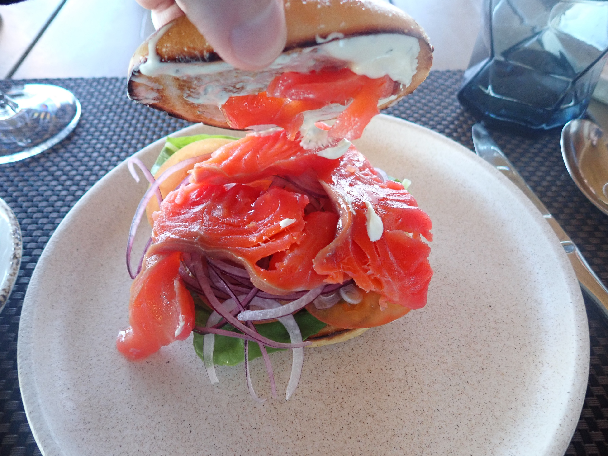 A plate of tomato and greens