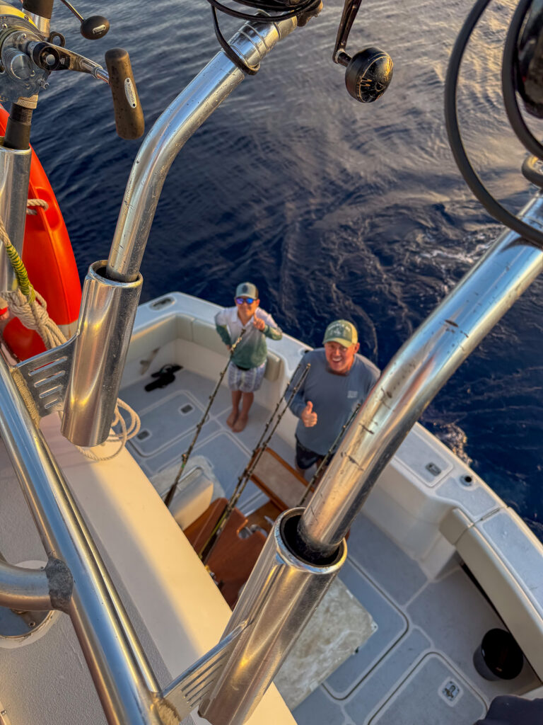 Looking down from the tower to the cockpit as the crew work the lines