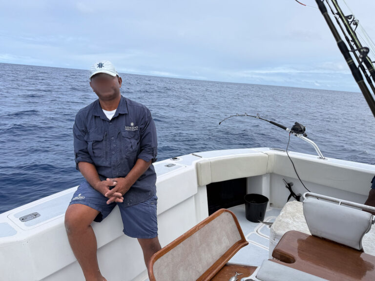 One of the crew resting in the cockpit between drops