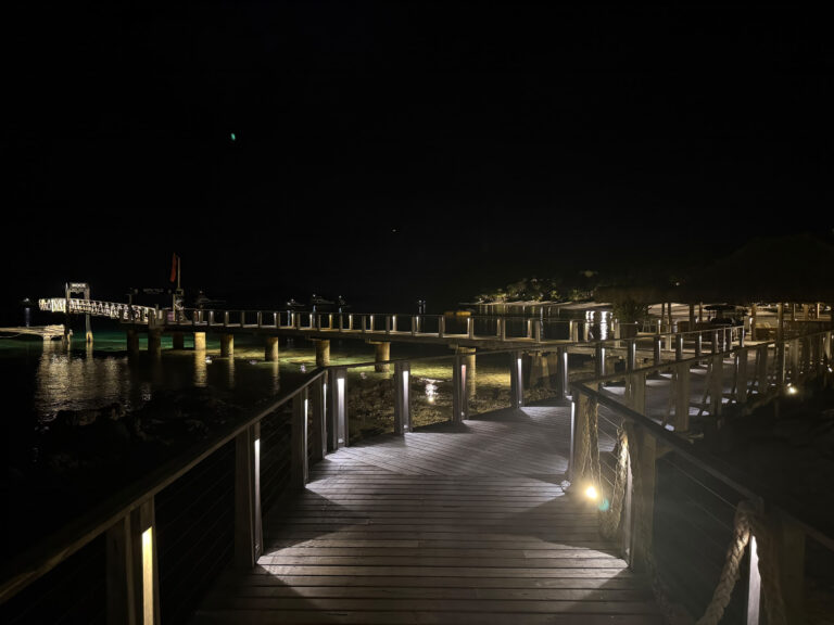 The jetty lit up on the walk back after dark