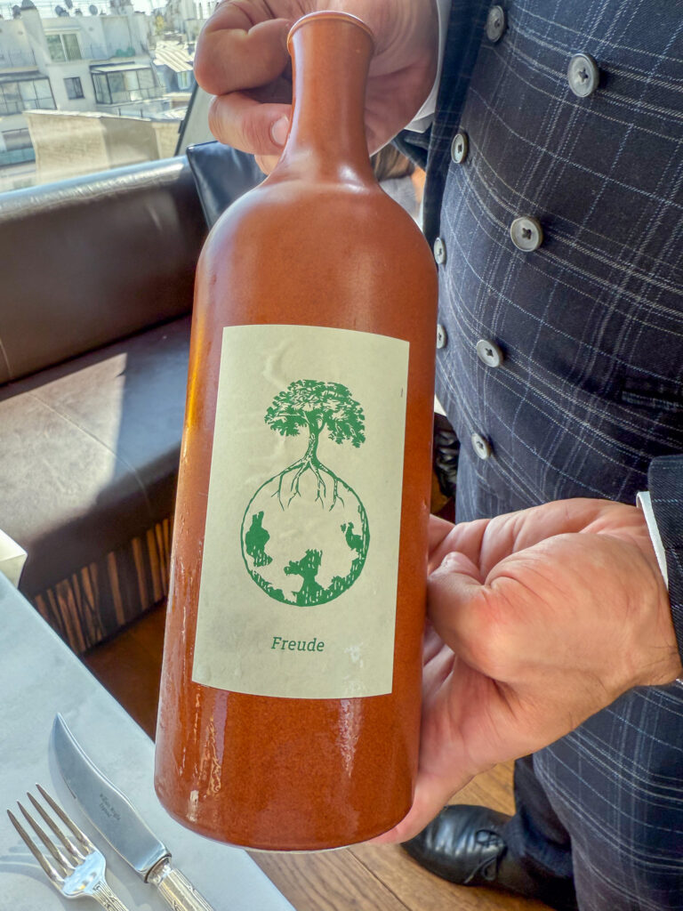 A ros&eacute; held up against the window