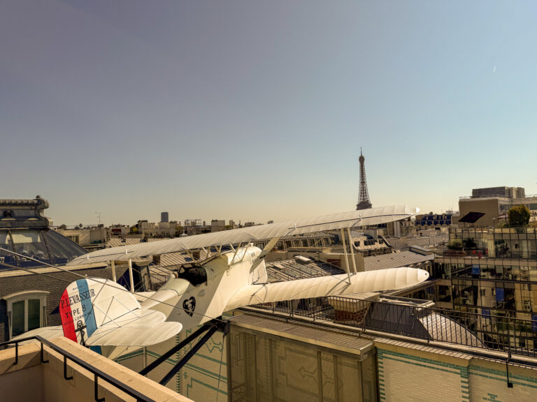 The aeroplane on the terrace, the tower beyond