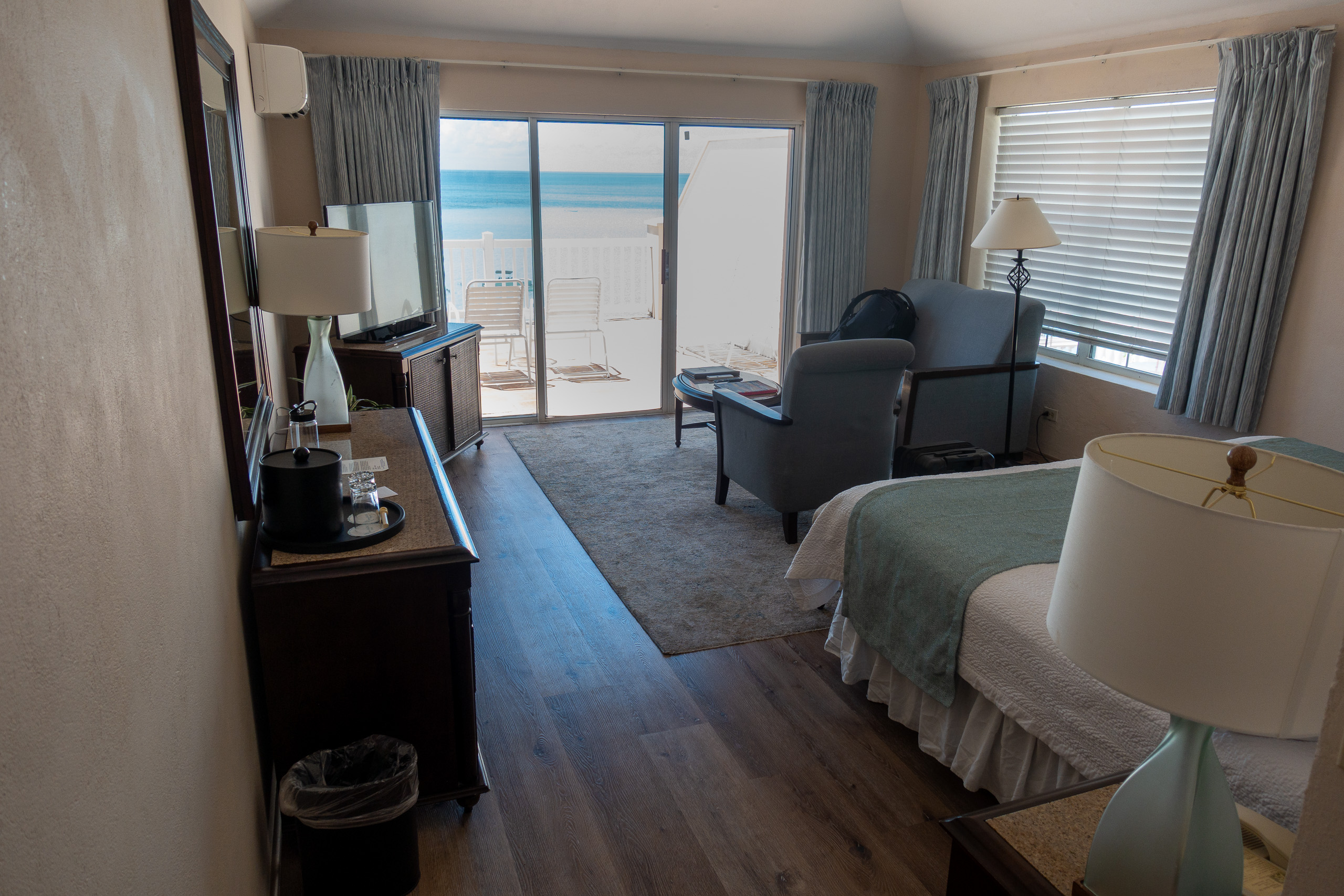 The room looking out through the sliding doors to the sea