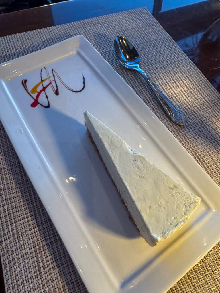 The place setting cleared and reset, cutlery squared up