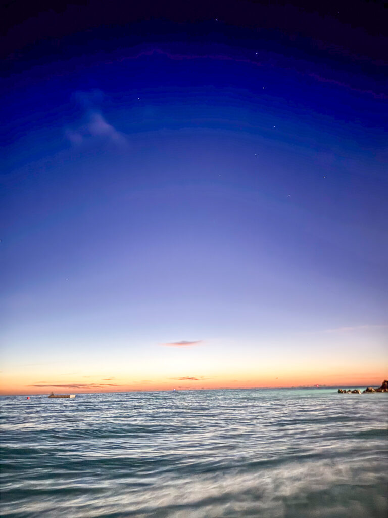 The last of the colour going out of the sky over the water