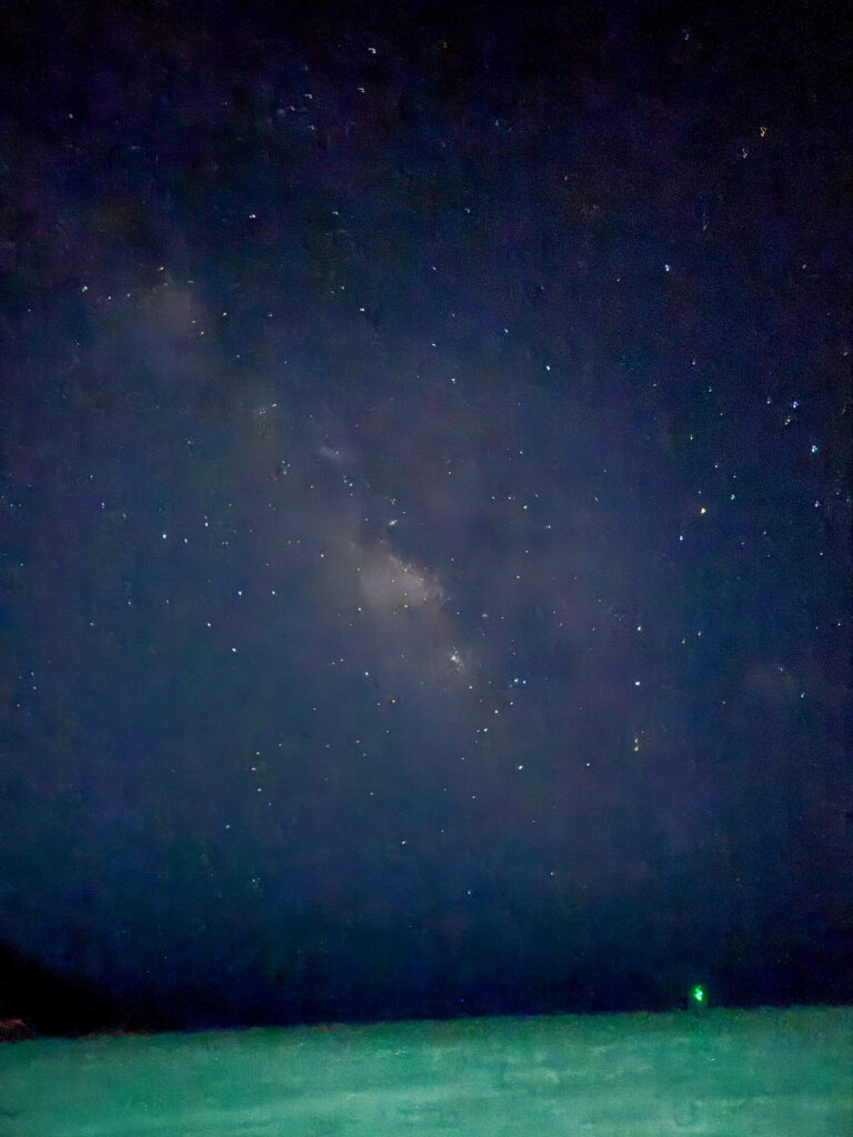 The night sky over the sea, the band of the galaxy overhead