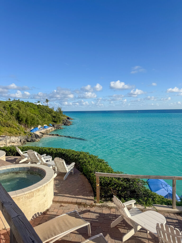 The terrace and the path dropping away to the turquoise bay