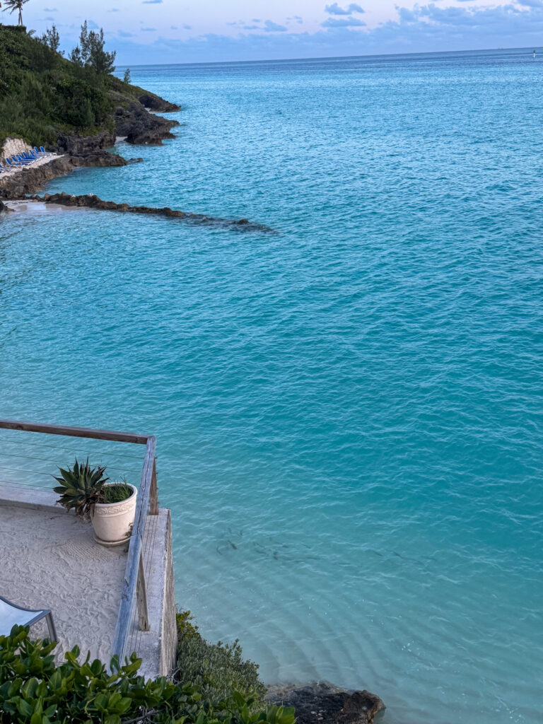 The shoreline where the rock meets the turquoise