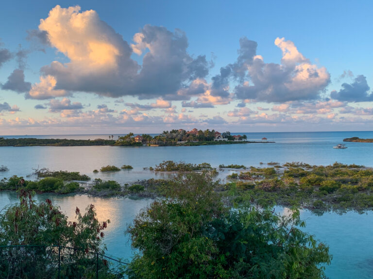 Evening cloud over the bay, the shallows turning from turquoise to grey