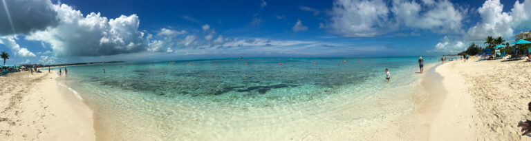 A wide panorama of the shallows running along the sand