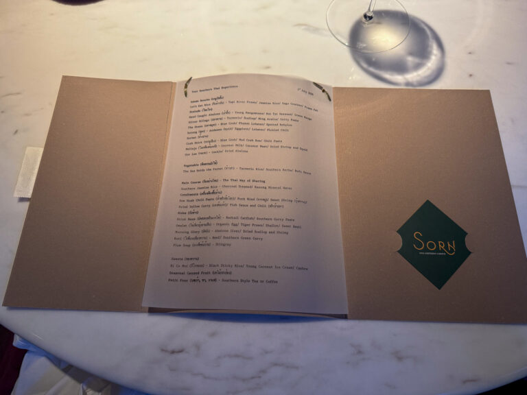 The menu open on the table