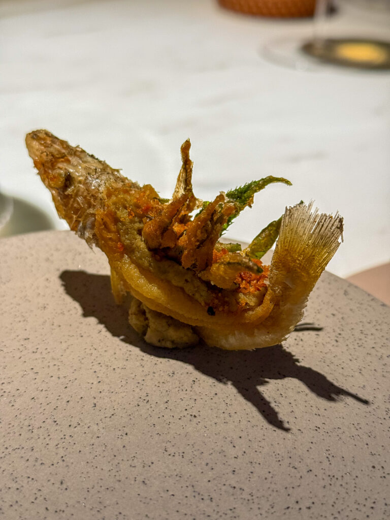 A single crisp-fried course on a plain plate
