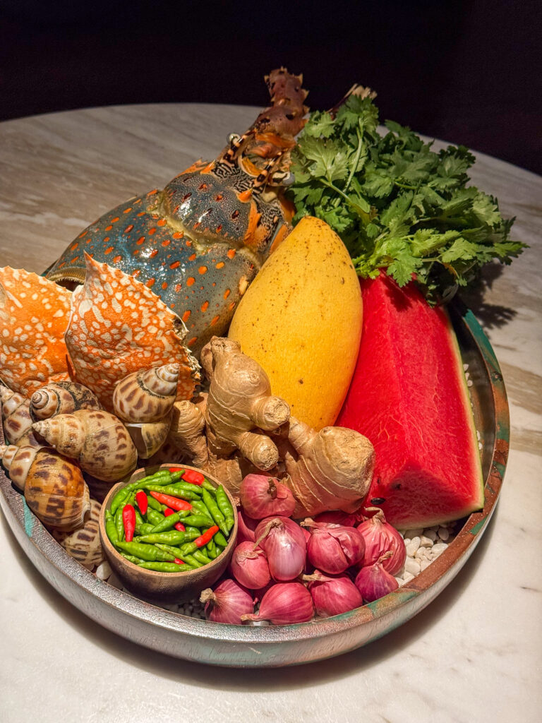 The raw ingredients of the course laid out on a tray