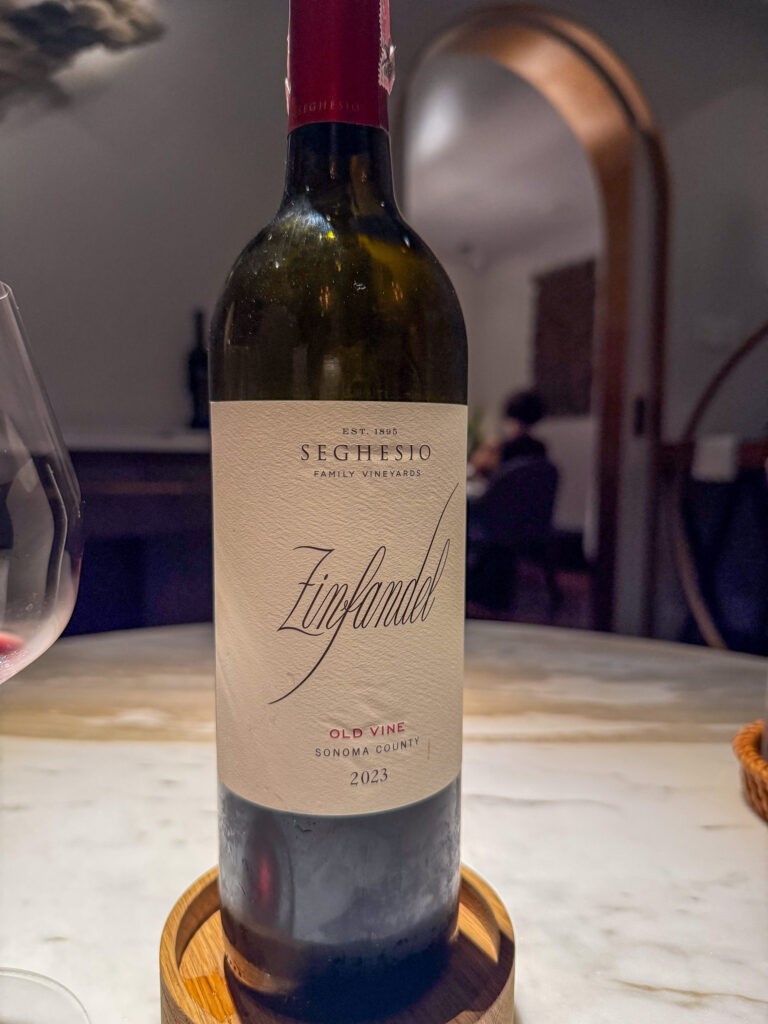 A bottle from the list, opened at the table