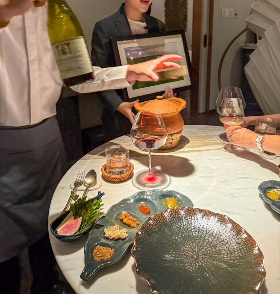 A clay pot carried to the table