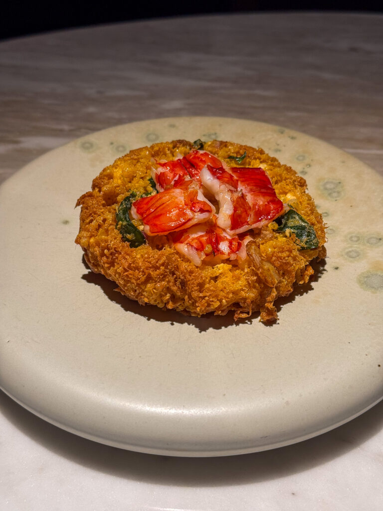 A composed course on a plain white plate