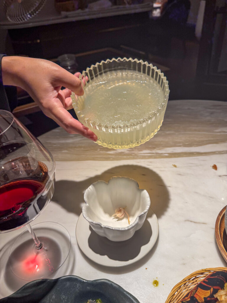 A small basket handed across the table
