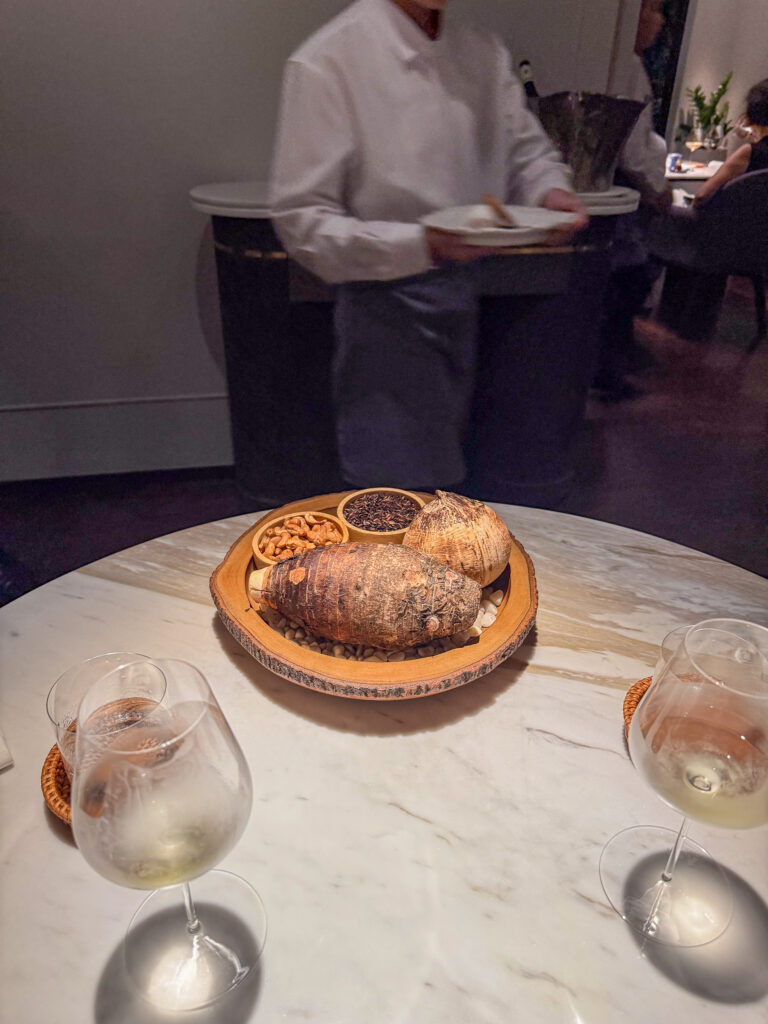 A round golden pastry on the table