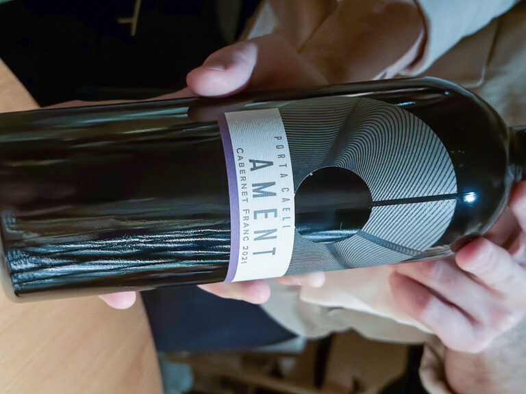 A dark bottle of Ament cabernet turned to the label