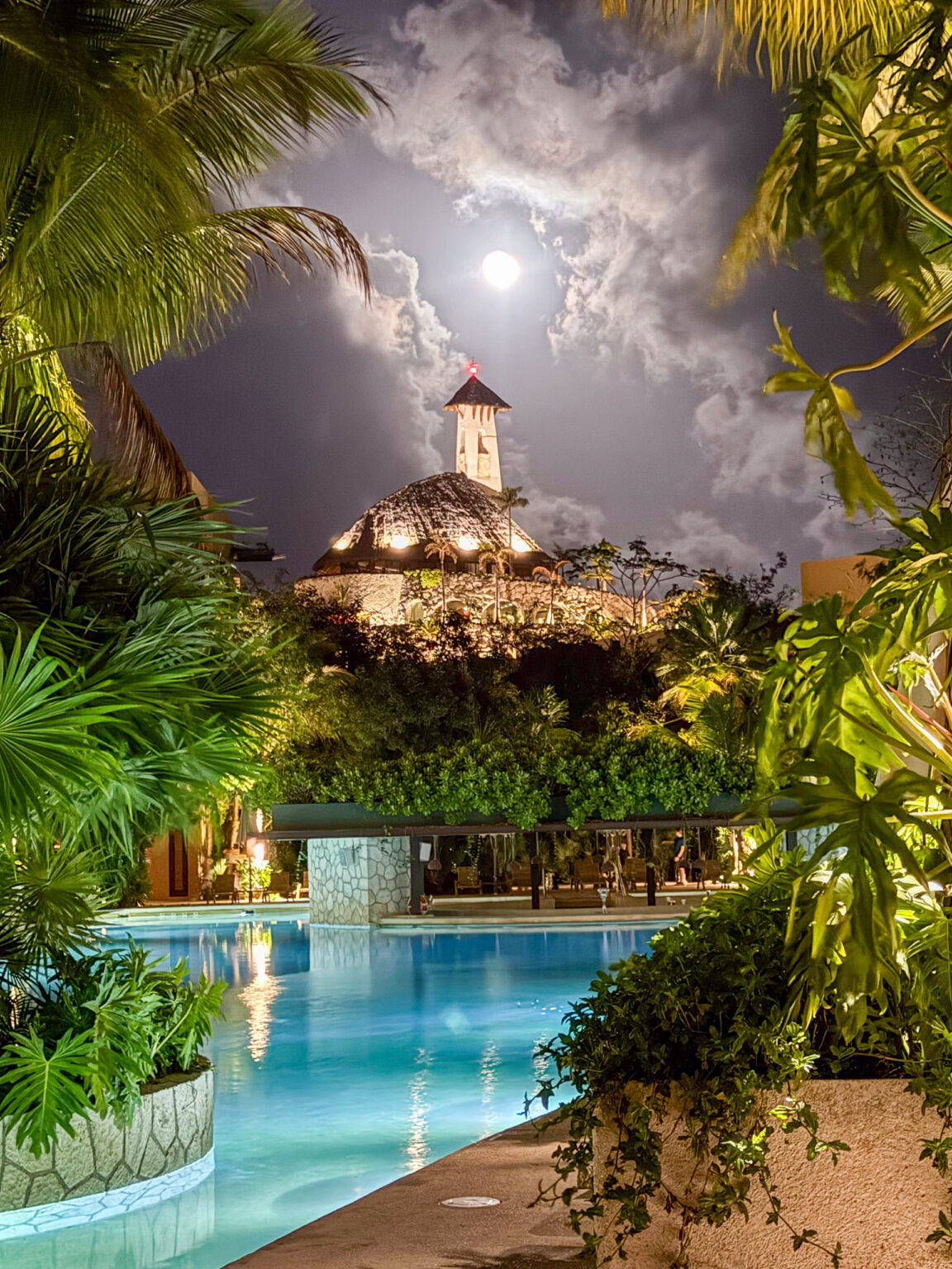 The moon above the tower, the pool holding the light below